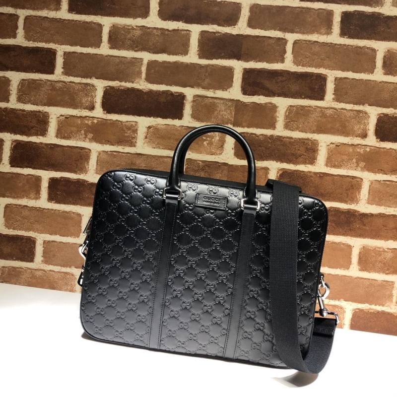 G*u*i top handle bags